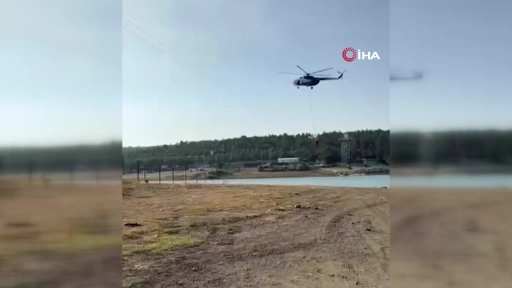 Yangına müdahale eden jandarma pilotundan büyük ustalık